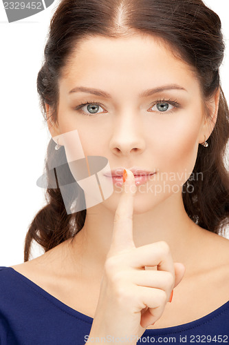 Image of finger on lips