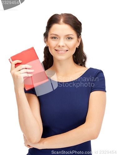 Image of happy and smiling woman with book