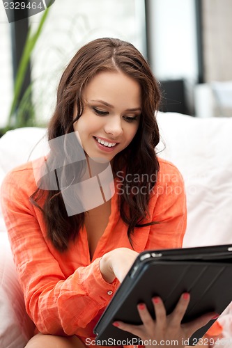 Image of happy woman with tablet pc computer