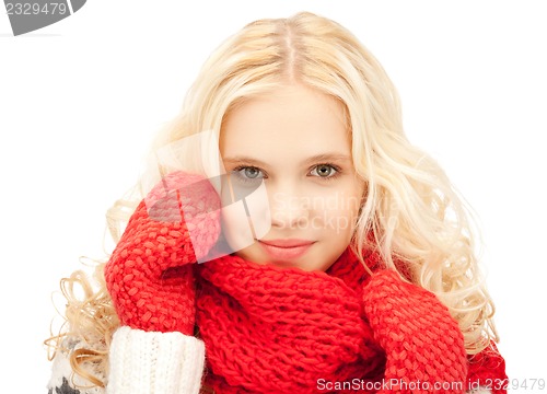 Image of beautiful woman in mittens