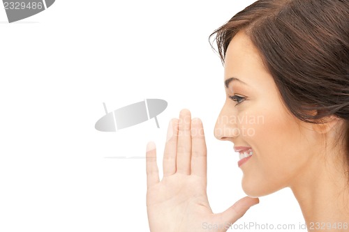 Image of woman whispering gossip