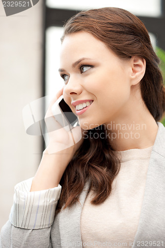 Image of businesswoman with cell phone