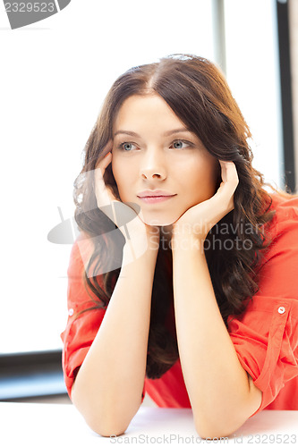 Image of calm and serious woman