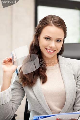 Image of happy woman with big notepad