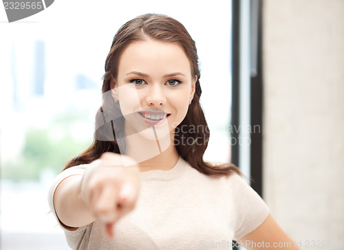 Image of businesswoman pointing her finger