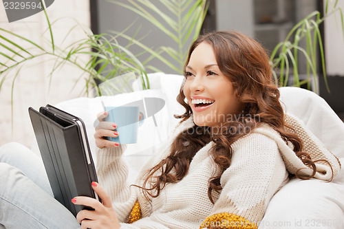 Image of happy woman with tablet pc computer