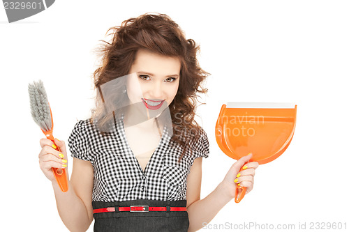 Image of beautiful woman with cleaning sweep