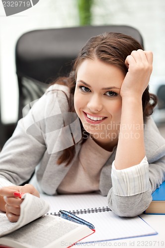 Image of happy woman with book