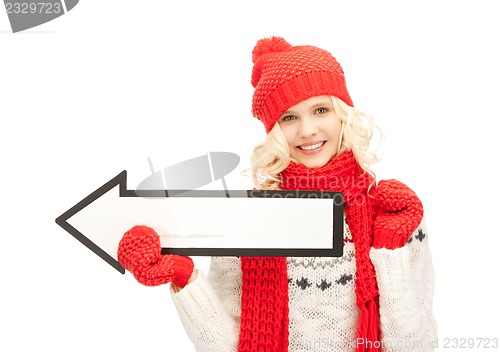 Image of woman with direction arrow sign