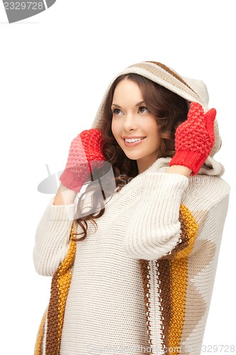 Image of beautiful woman in white sweater