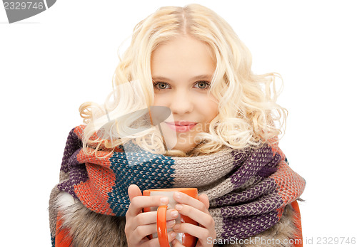 Image of woman with red mug