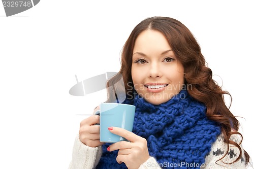 Image of woman with blue mug