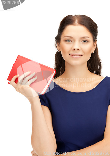 Image of happy and smiling woman with book