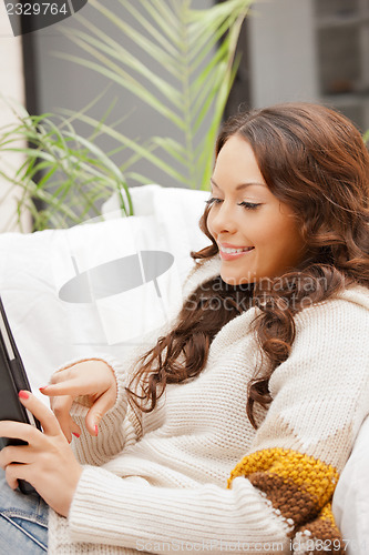 Image of happy woman with tablet pc computer