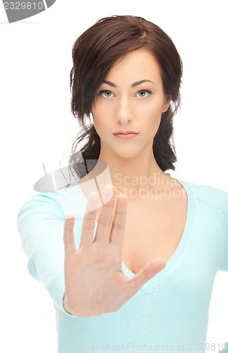 Image of woman making stop gesture