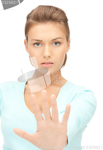 Image of woman making stop gesture