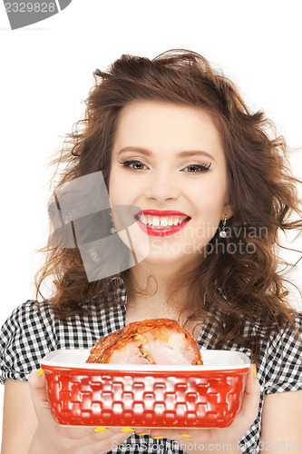 Image of lovely housewife with meat