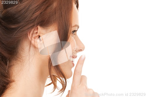 Image of finger on lips