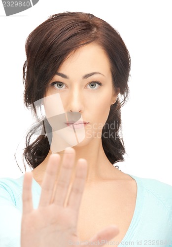 Image of woman making stop gesture