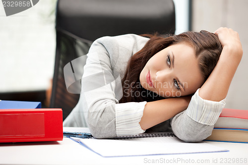 Image of sleeping woman with book