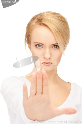 Image of woman making stop gesture