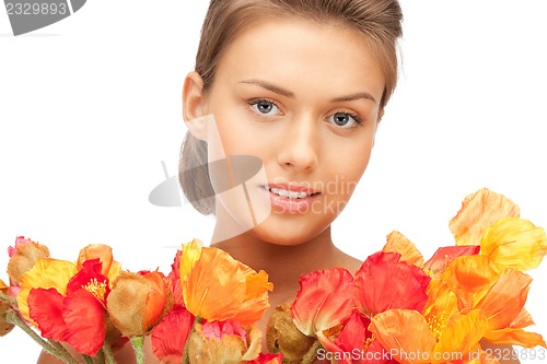 Image of lovely woman with red flowers