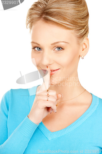 Image of finger on lips