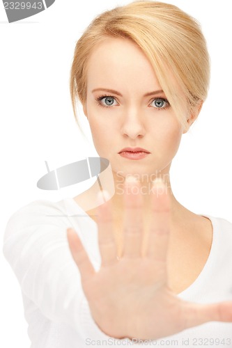 Image of woman making stop gesture