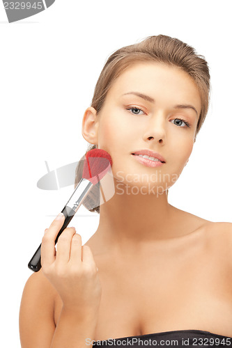 Image of beautiful woman with brush