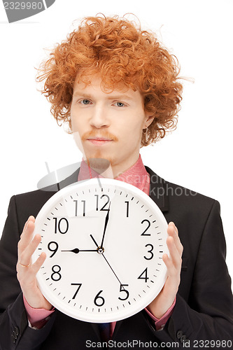 Image of man with clock