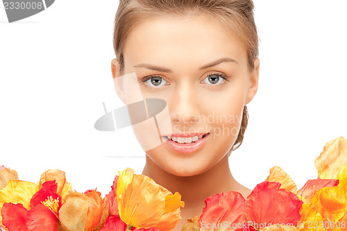 Image of lovely woman with red flowers