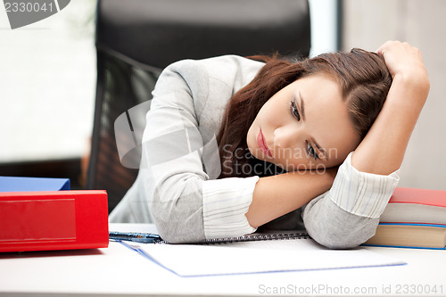 Image of sleeping woman with book