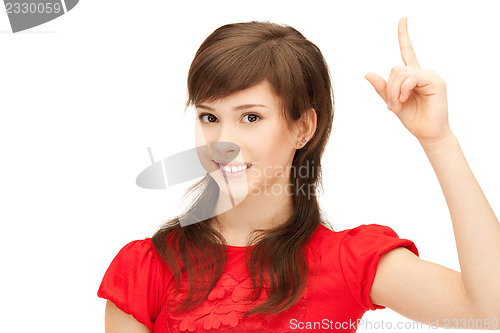 Image of teenage girl with her finger up