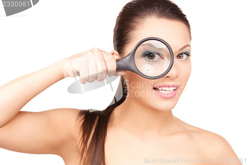 Image of woman with magnifying glass