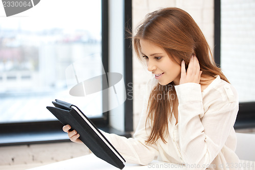 Image of happy woman with tablet pc computer