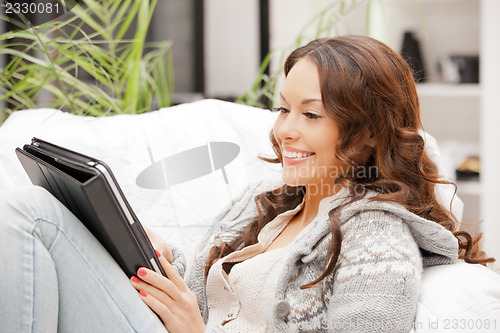 Image of happy woman with tablet pc computer