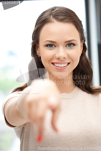 Image of businesswoman pointing her finger