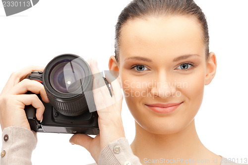 Image of teenage girl with digital camera