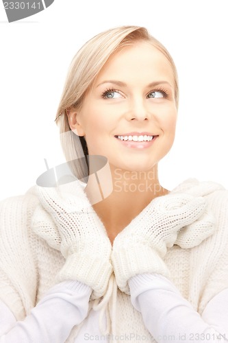 Image of beautiful woman in white sweater