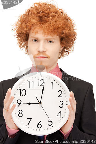 Image of man with clock