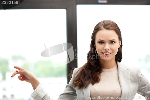 Image of businesswoman pointing her finger