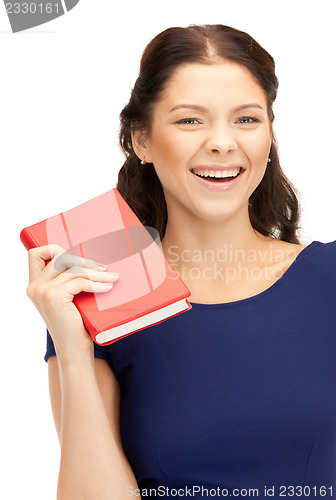 Image of happy and smiling woman with book