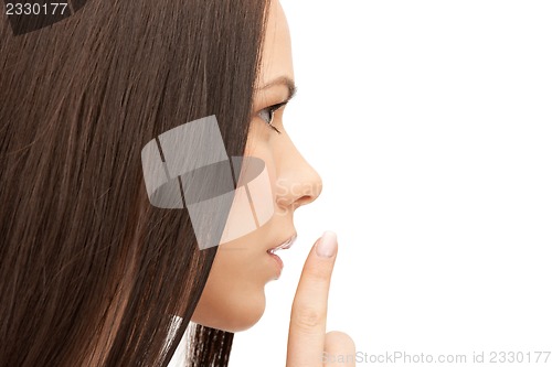 Image of finger on lips