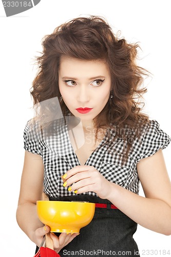Image of lovely housewife with cup