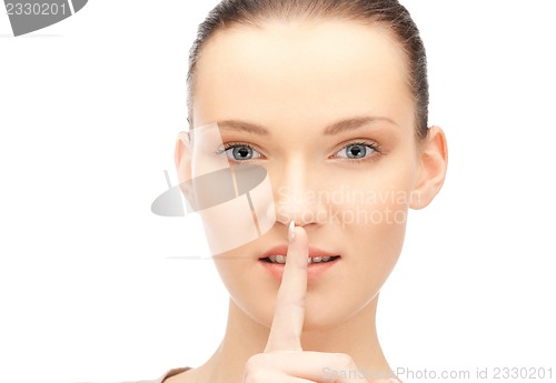 Image of finger on lips