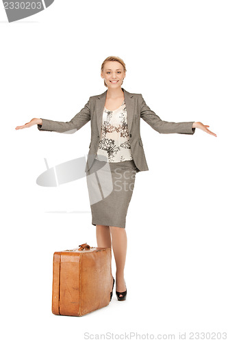 Image of lovely woman with suitcase