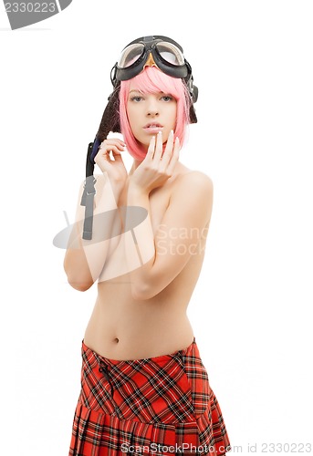 Image of topless pink hair girl in aviator helmet