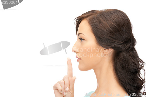 Image of finger on lips