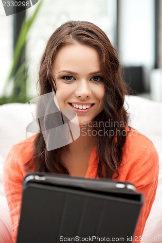 Image of happy woman with tablet pc computer