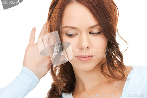 Image of woman listening gossip